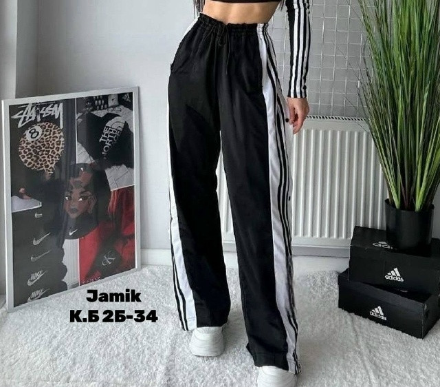 Эксклюзивные штаны с боковыми разрезами на заклёпках и с высокой посадкой на талии — удобно, практично и эффектно купить в Интернет-магазине Садовод База - цена 900 руб Садовод интернет-каталог