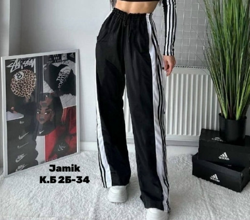 Эксклюзивные штаны с боковыми разрезами на заклёпках и с высокой посадкой на талии — удобно, практично и эффектно САДОВОД официальный интернет-каталог