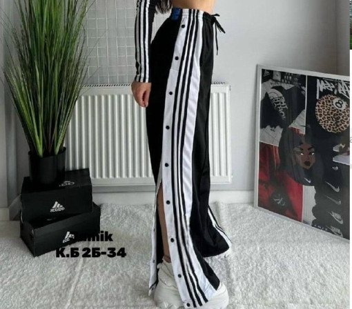 Эксклюзивные штаны с боковыми разрезами на заклёпках и с высокой посадкой на талии — удобно, практично и эффектно САДОВОД официальный интернет-каталог