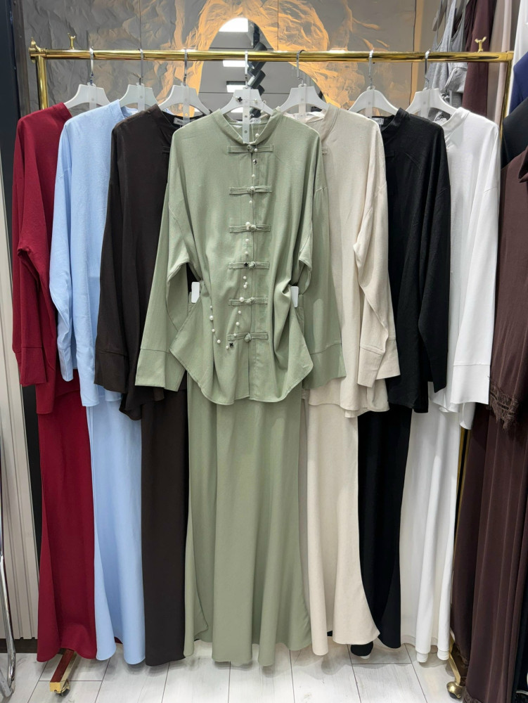 Женский костюм зеленый